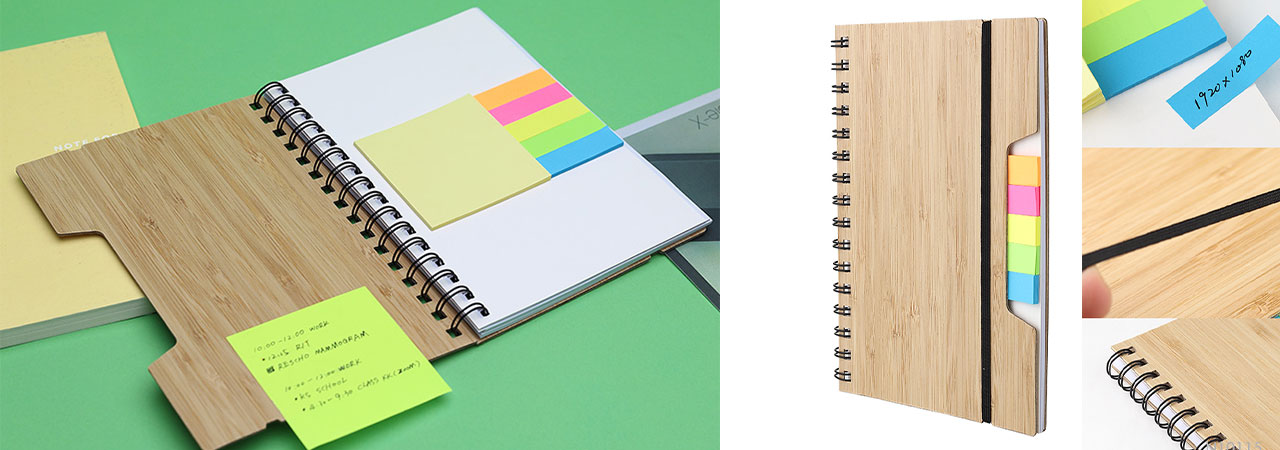 Our A5 Size ECO Spiral Binding Bamboo Cover Notebook with Sticky Note Pads combines sustainability with practicality. Featuring a bamboo cover and spiral binding, this notebook includes 60 sheets of 70gsm recycled paper, perfect for office, school, and promotional use. It is available in a natural bamboo color and can be customized with a printed logo for personalized branding. An ideal gift for environmentally conscious businesses and individuals.